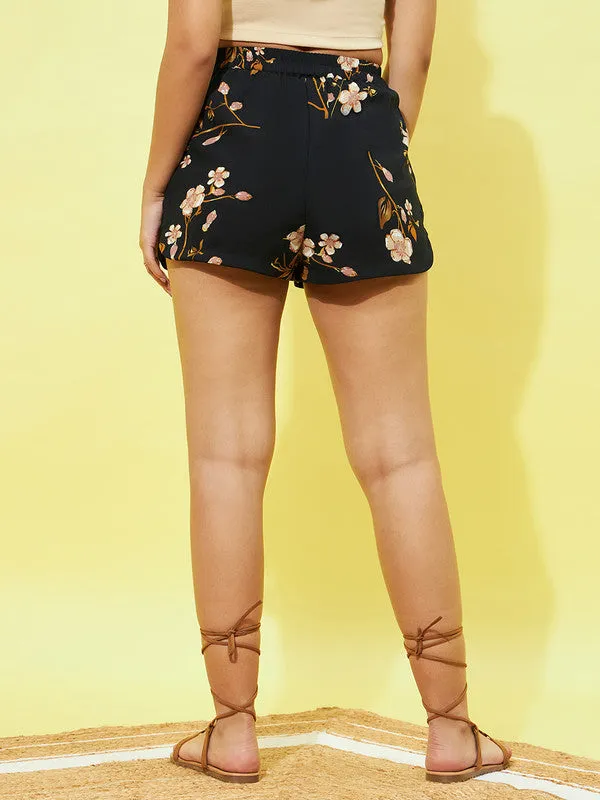 Berrylush Women Black & Yellow Floral Printed High-Rise Elastic Waist Tie-Up Slip-On Mini Summer Shorts