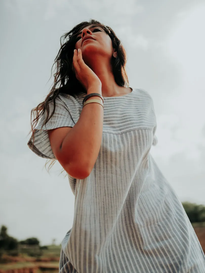 Boat-Neck Dress with a Pleated back.